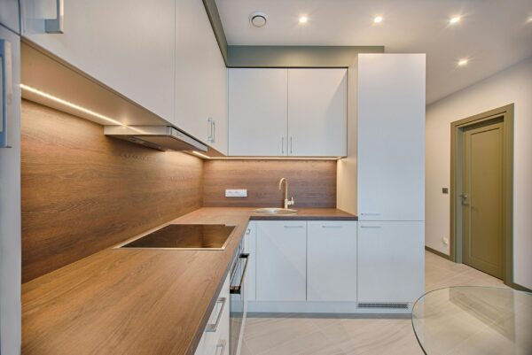 Bespoke fitted kitchen with an island and integrated storage