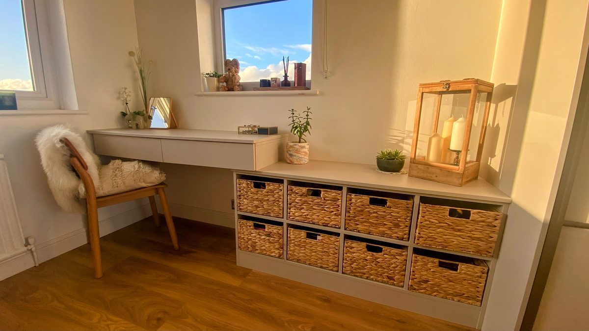 Fitted home office with a bespoke desk, shelving and cupboards