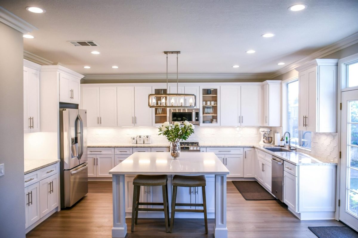 Handcrafted bespoke fitted kitchen with an island and integrated storage